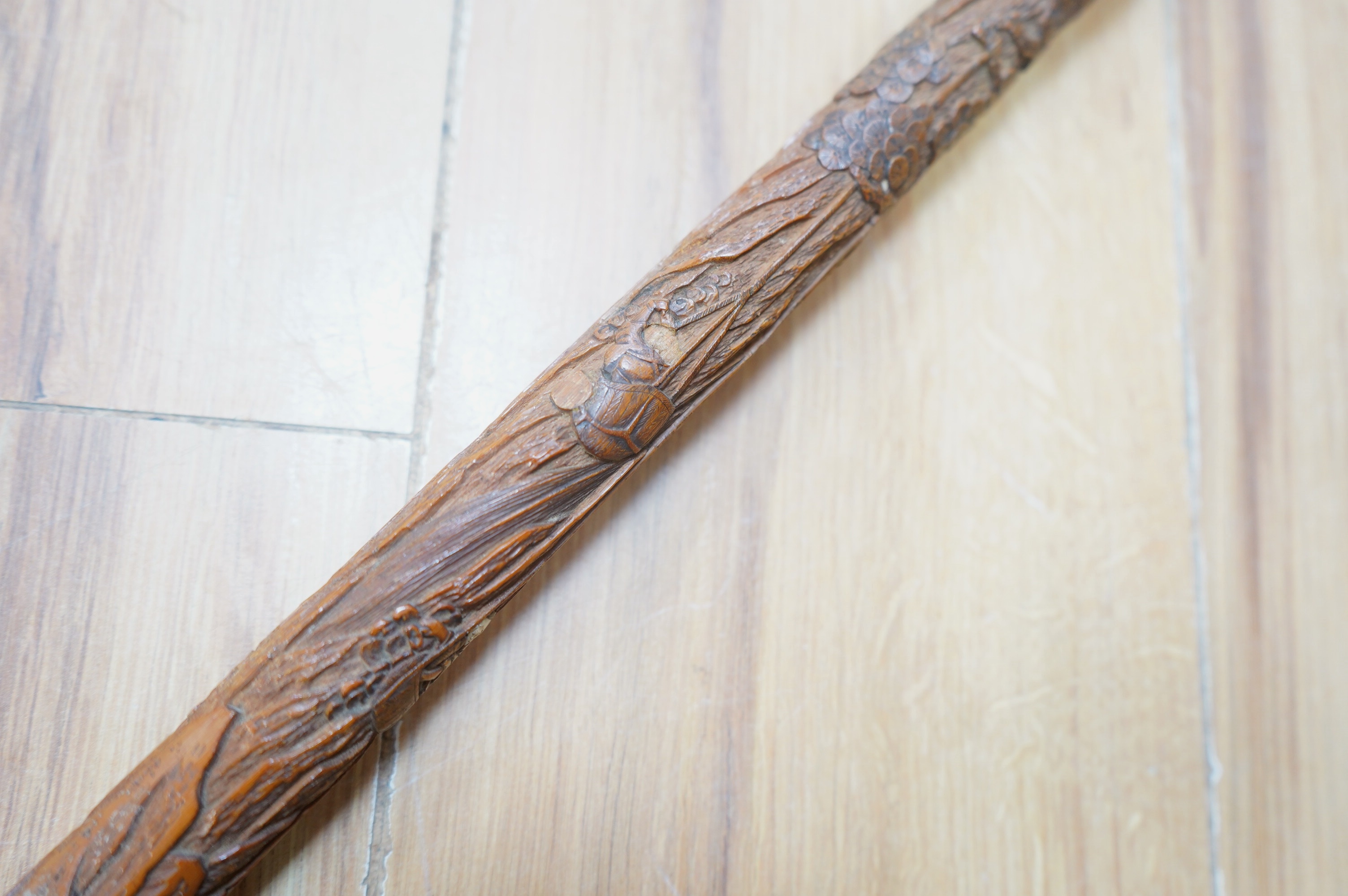 A Japanese carved bamboo walking cane with mother of pearl and ivory inlay. 89.5cm long. CITES Submission reference Submission reference 3UEQCLUL. Condition - fair